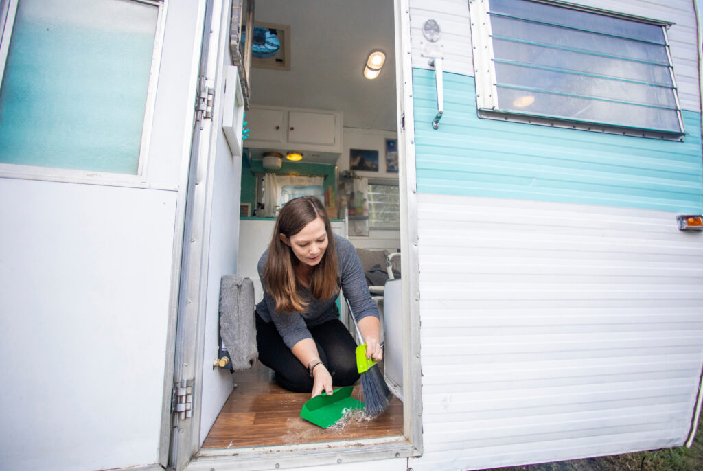 woman cleaning rv interior cleaning